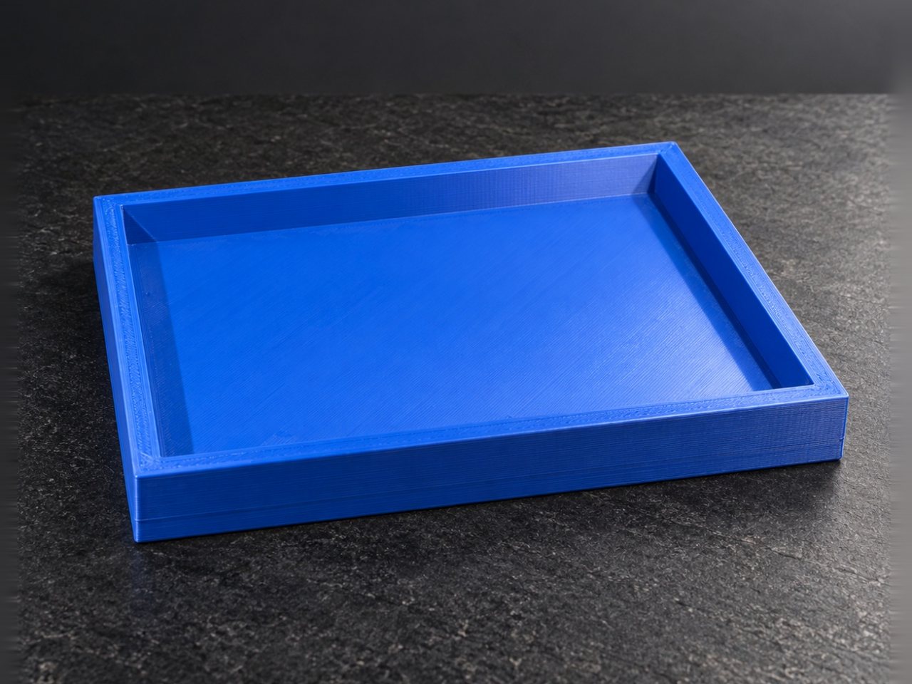 Geprinte rechthoekige bak in blauw materiaal
